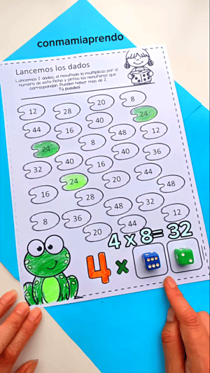 plantilla de Lancemos los Dados a medio jugar, con la multiplicación anotada y varias figuras ya pintadas