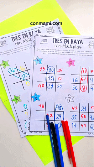 Dos plantillas de Tres en Raya con Múltiplos completamente jugadas, con las estrellas pintadas